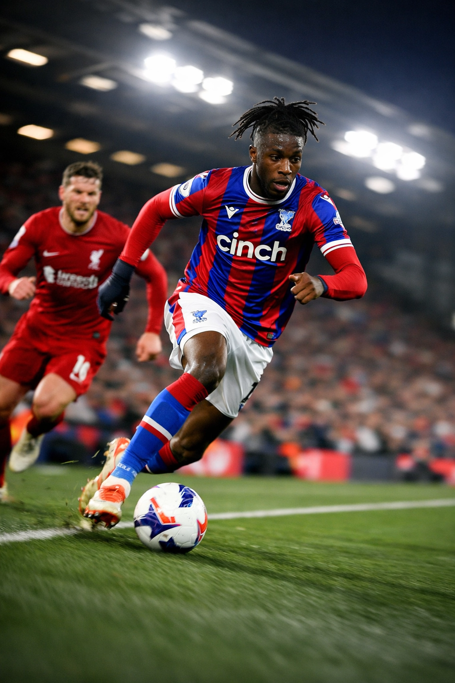 Crystal Palace winger attacking Liverpool defender during their third consecutive victory this season