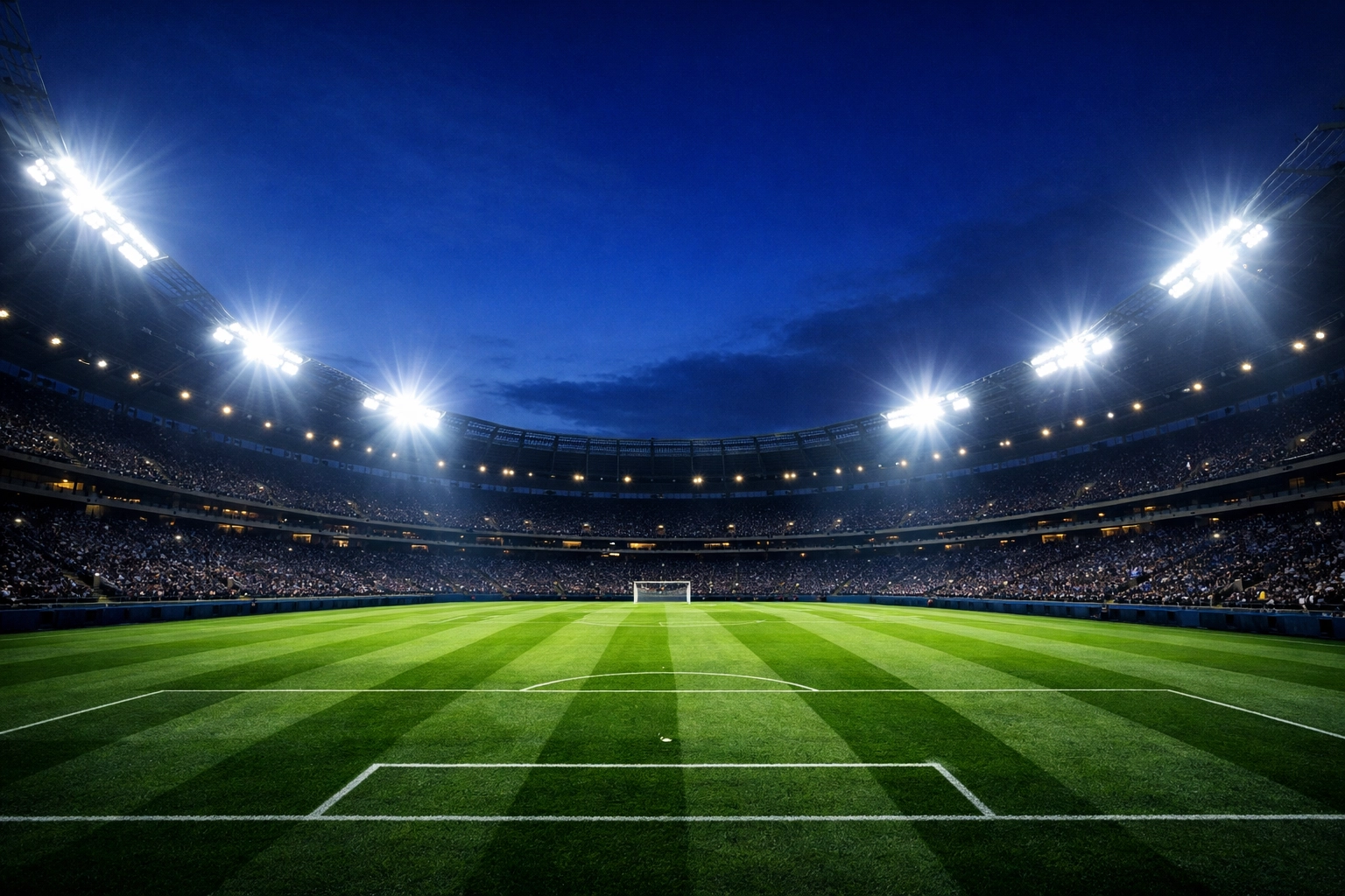 Modernes Fußballstadion unter Flutlicht vor dem Bundesliga-Topspiel Stuttgart gegen Leipzig.