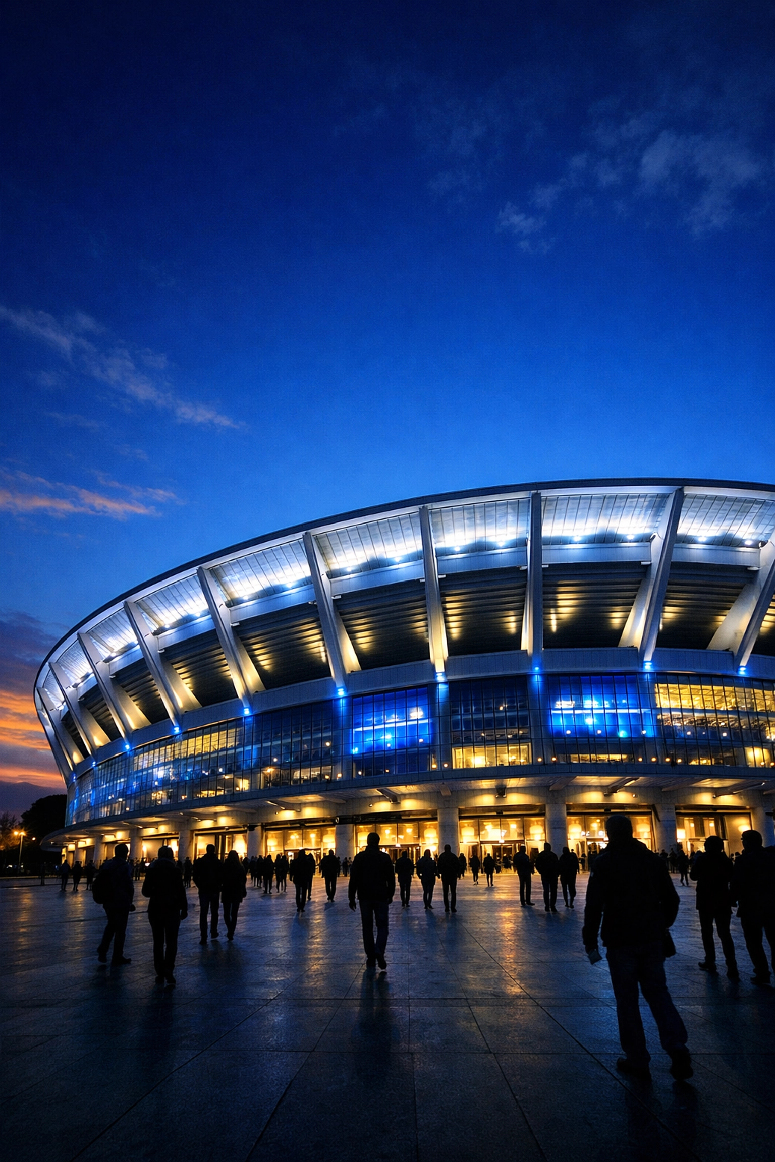 Modernes Fußballstadion bei Nacht als Kulisse für exklusive Sportwetten Tipps.