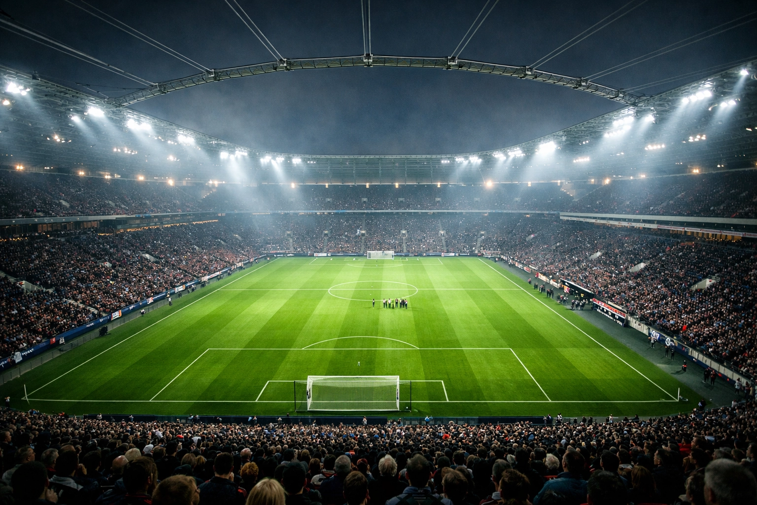 BayArena Leverkusen bei Nacht: Dramatische Stadion-Atmosphäre für das Bundesliga-Topspiel.