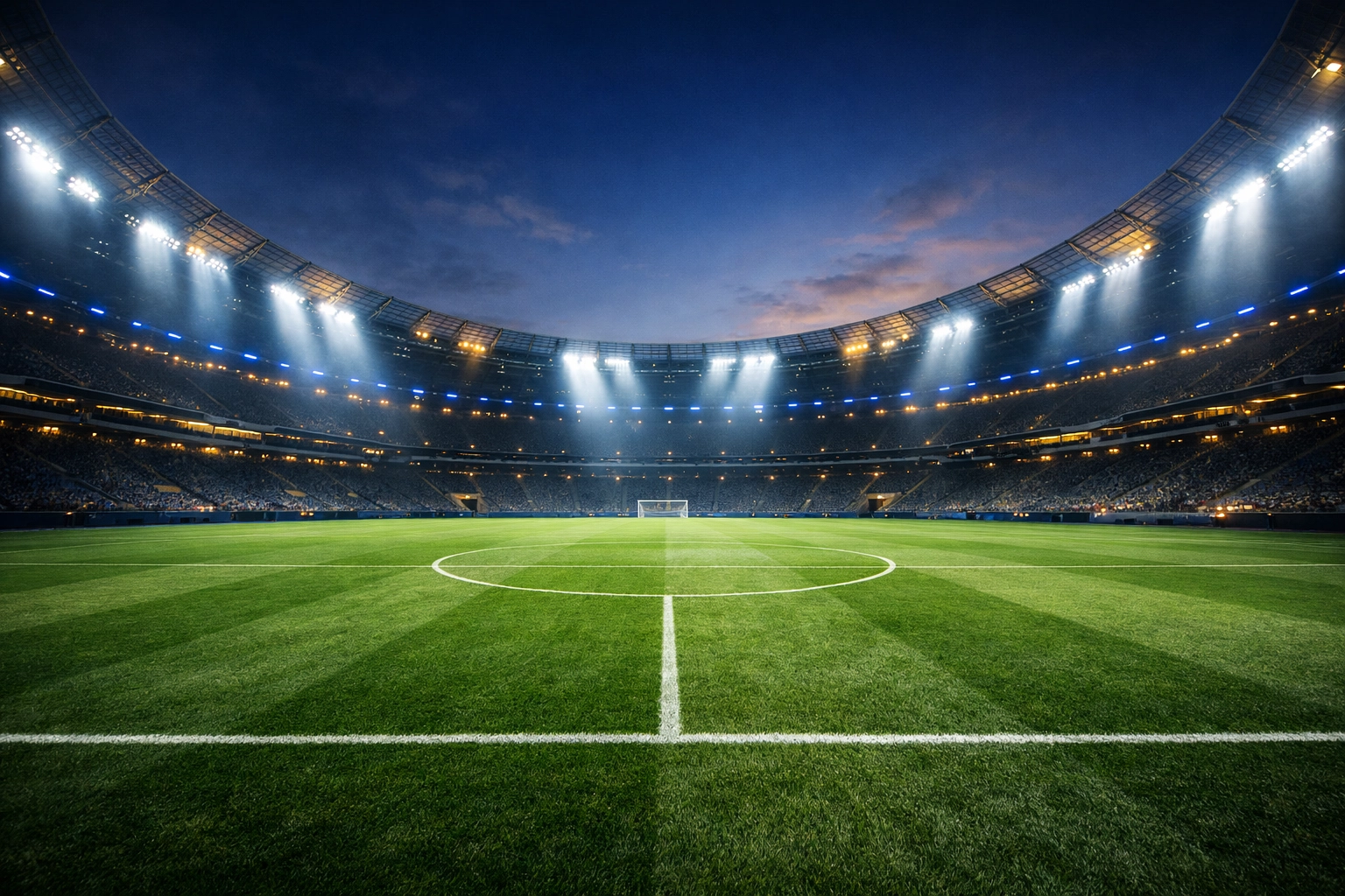 Moderner Fußballrasen im Stadionflutlicht für die Analyse von City gegen Real Madrid.