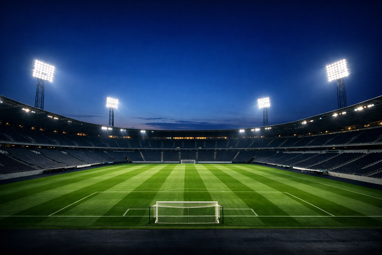 Beleuchtetes Fußballstadion bei Dämmerung zur Analyse aktueller Markttrends.