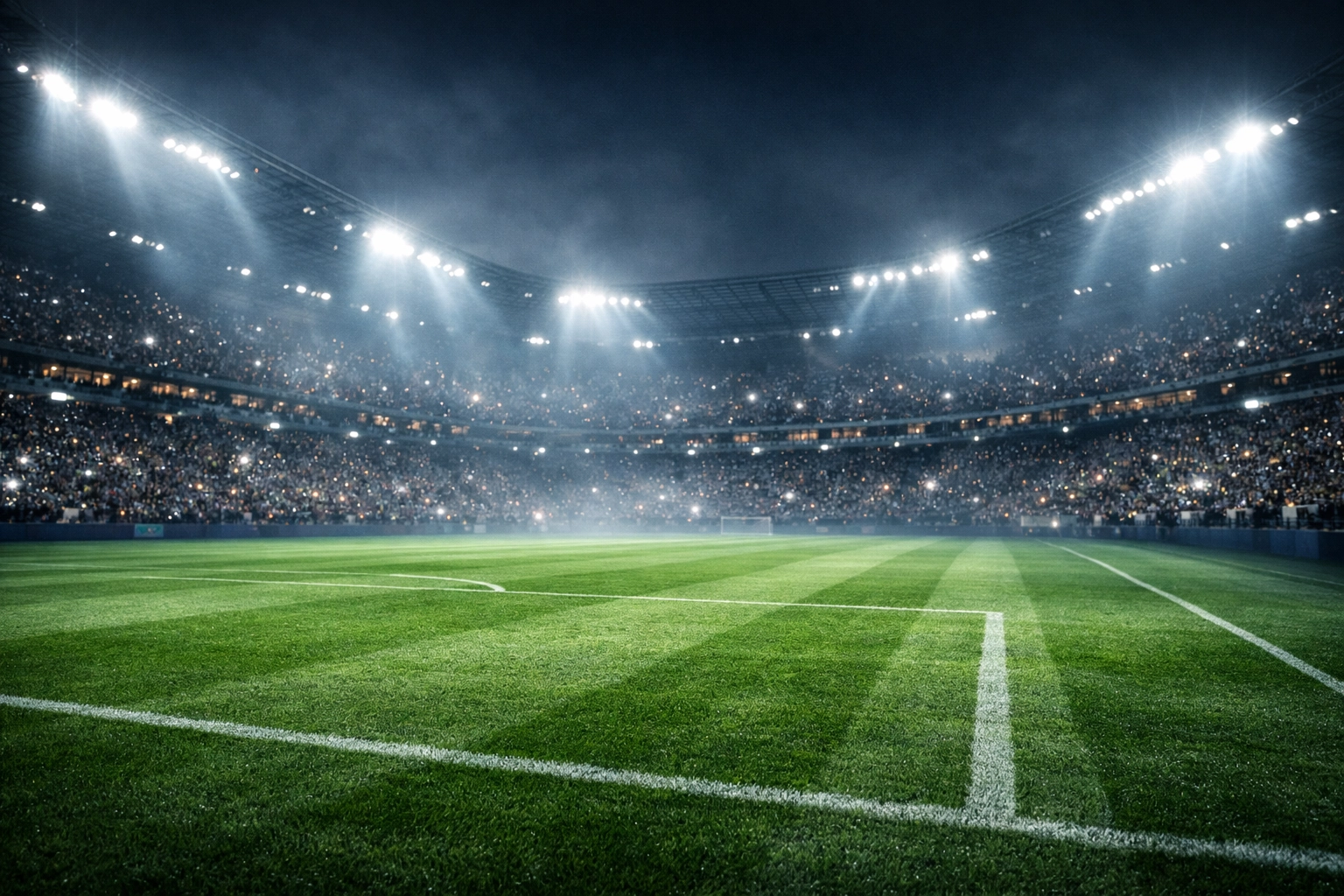 Beleuchtetes Fußballstadion bei Nacht vor dem Champions League Viertelfinale Arsenal gegen Sporting CP.