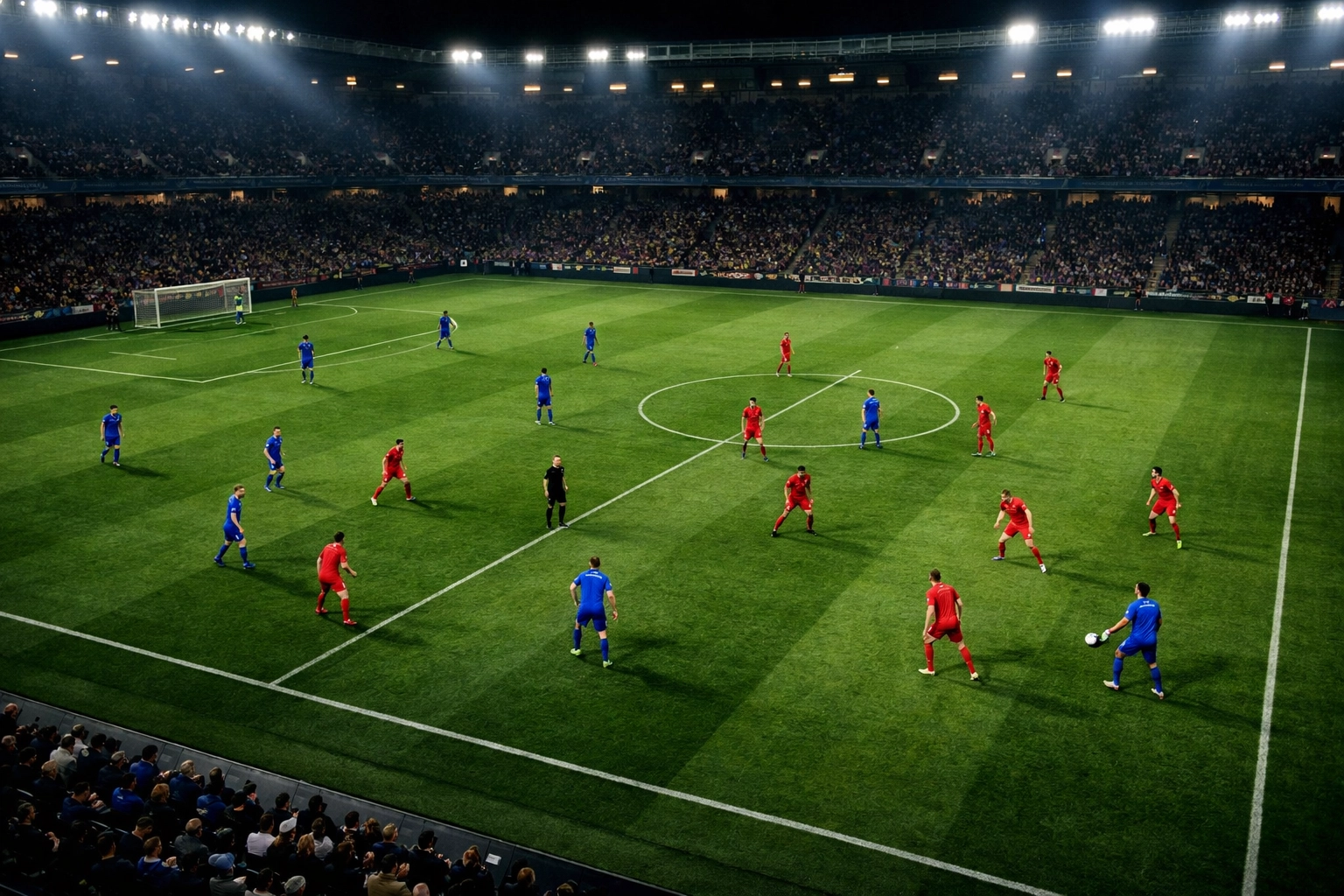 Taktische Formation der Spieler beim Duell Chelsea gegen Manchester United im Flutlicht.