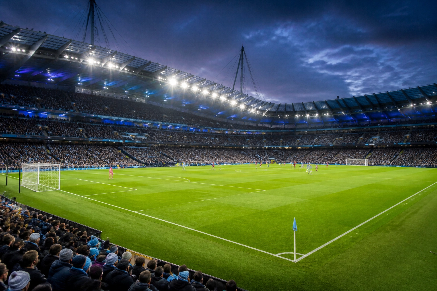 Beleuchtetes Etihad Stadium bei Abenddämmerung vor dem Spiel Manchester City gegen Brentford.