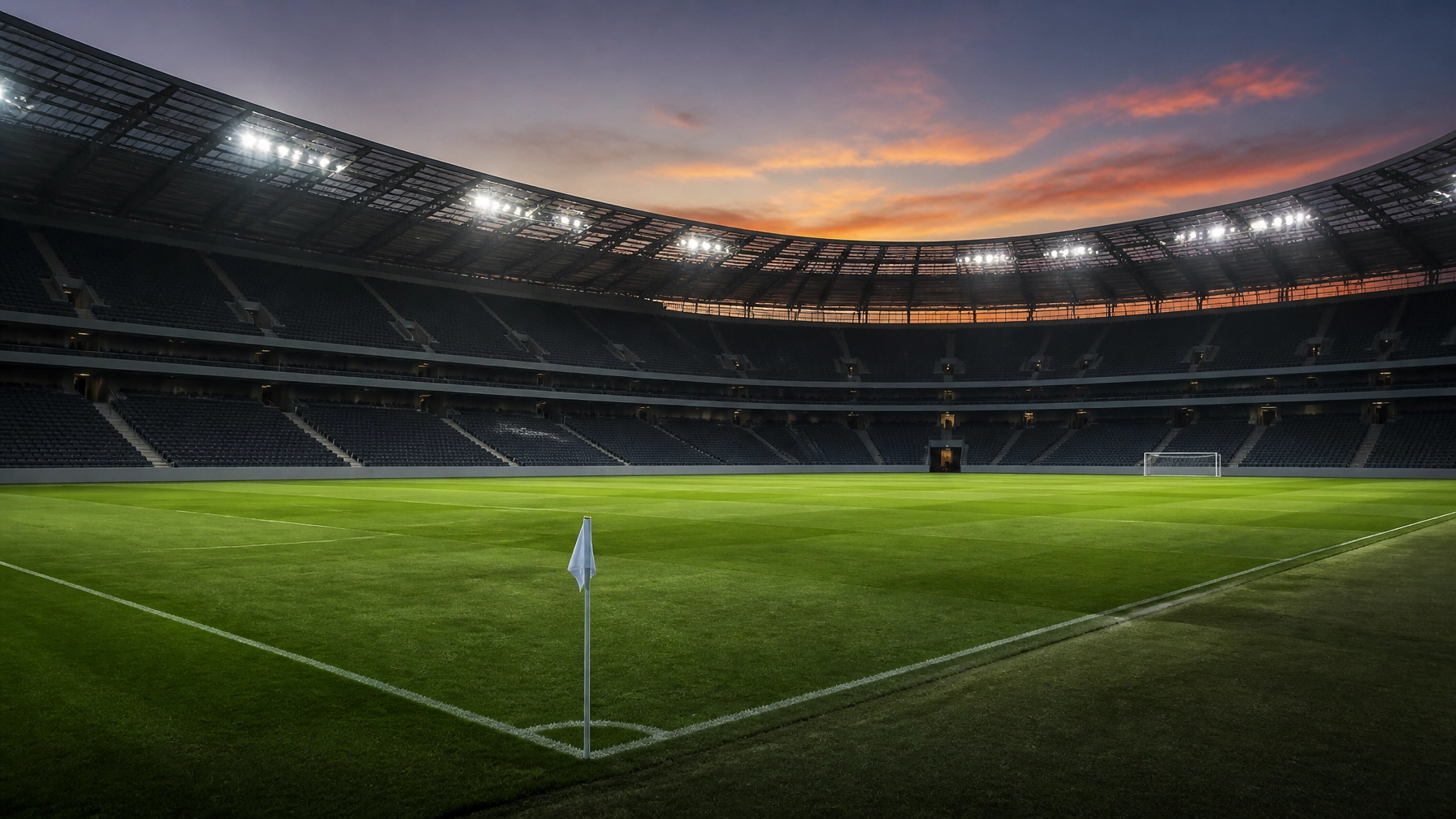 Ein leeres Fußballstadion in der Dämmerung, das die konzentrierte Atmosphäre vor einem großen Ereignis widerspiegelt