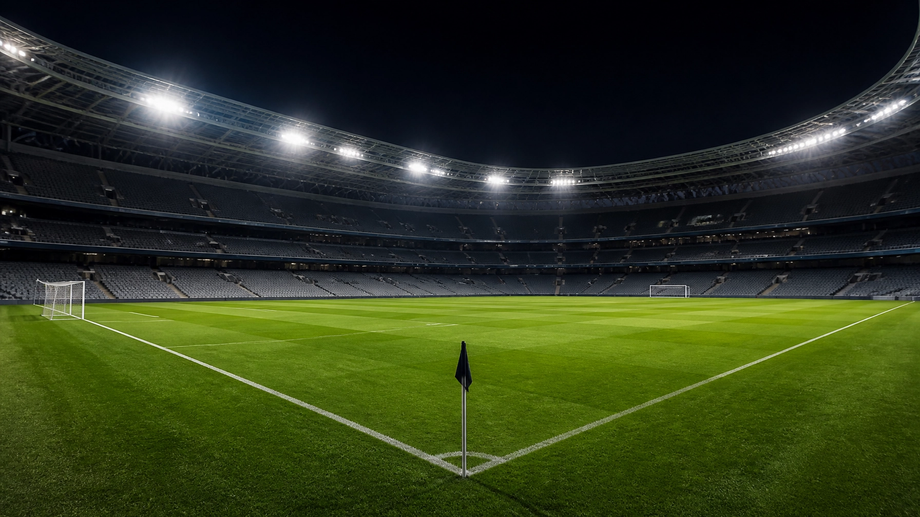 Atmosphärisches Fußballstadion bei Nacht unter Flutlicht