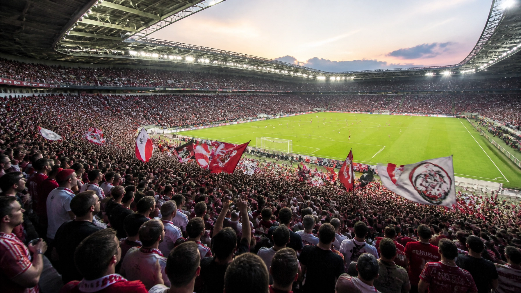 Stimmungsvolle Ränge in der Arena beim Flutlichtspiel