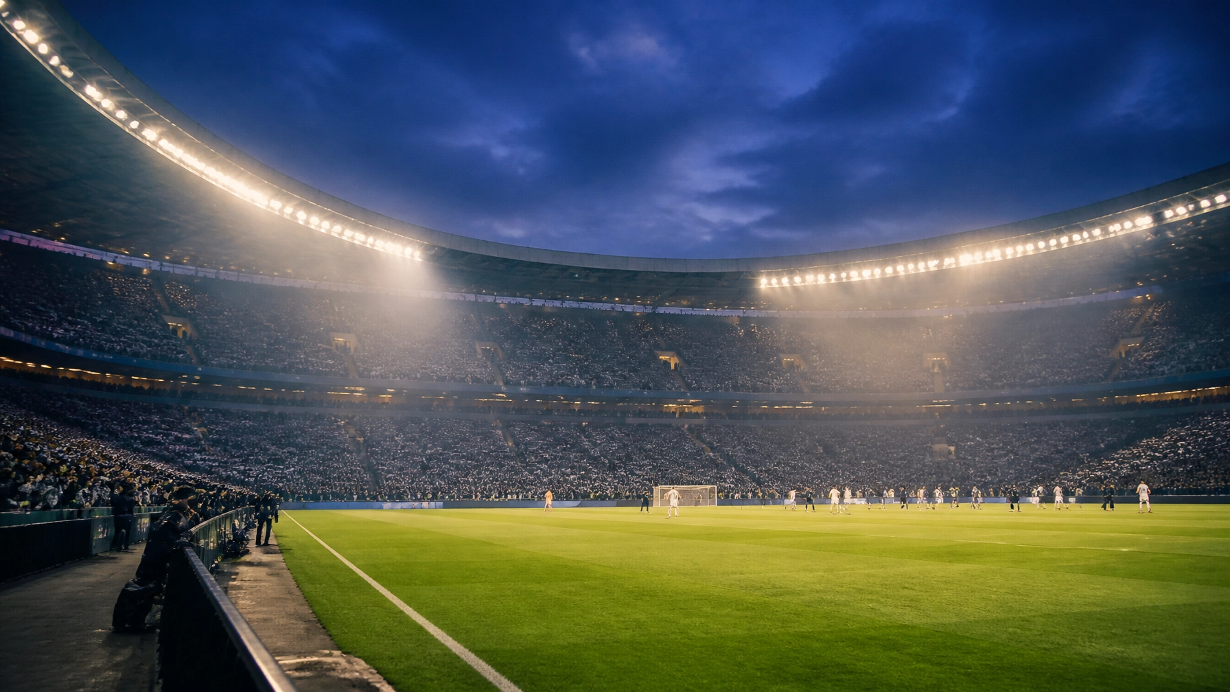 Volle Bundesliga-Tribüne beim Saisonauftakt unter Flutlicht ohne Logos und lesbare Werbung