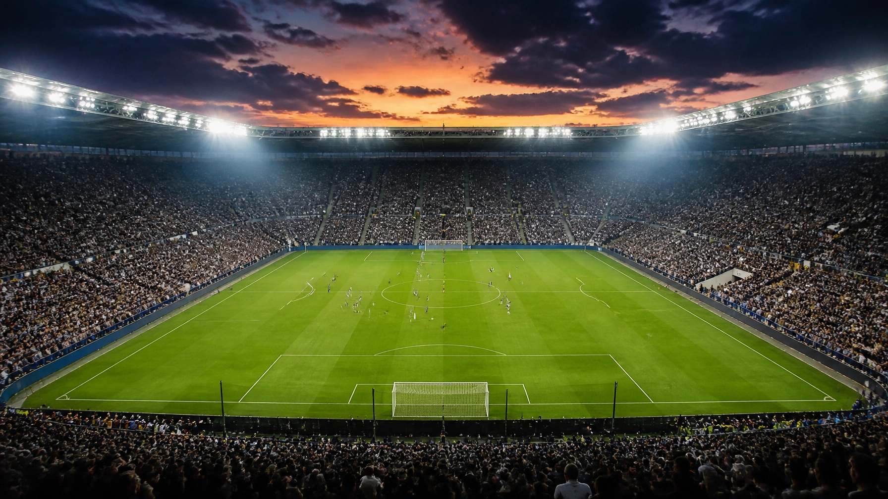 Atmosphäre in einem europäischen Fußballstadion unter Flutlicht