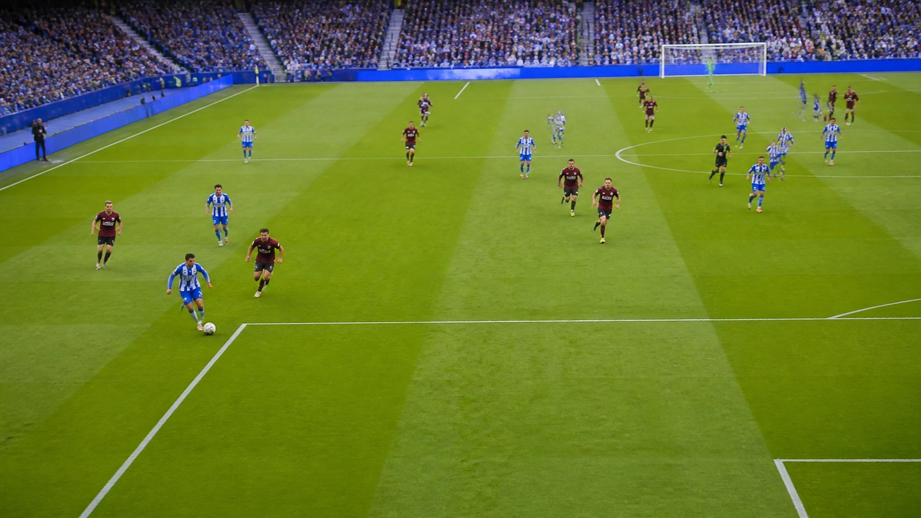 Spielszene im American Express Stadium mit Brighton- und Aston-Villa-Farben