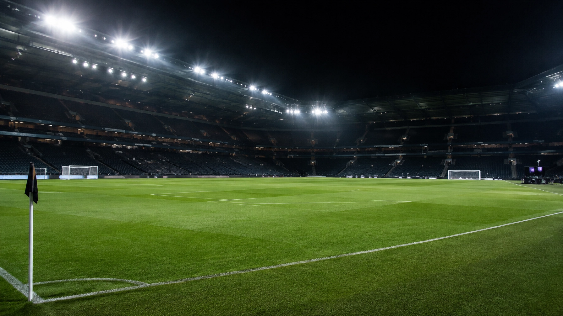 Beleuchtetes Stadion nach einem kontroversen Premier-League-Spiel mit dezenter VAR-Atmosphäre